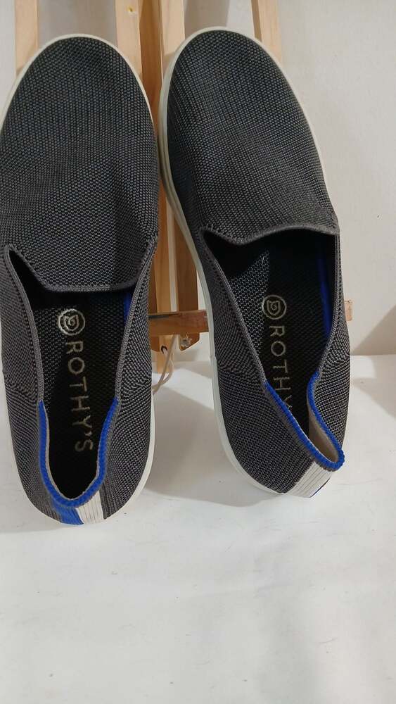 Rothy's Black Slip-On Sneakers with Blue Trim